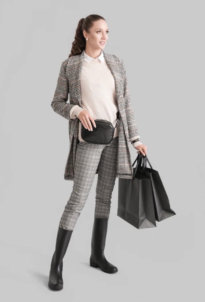 Model in gray plaid coat